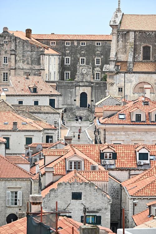 Free A picturesque view of the iconic rooftops and architecture in Dubrovnik's historic Old Town, Croatia. Stock Photo