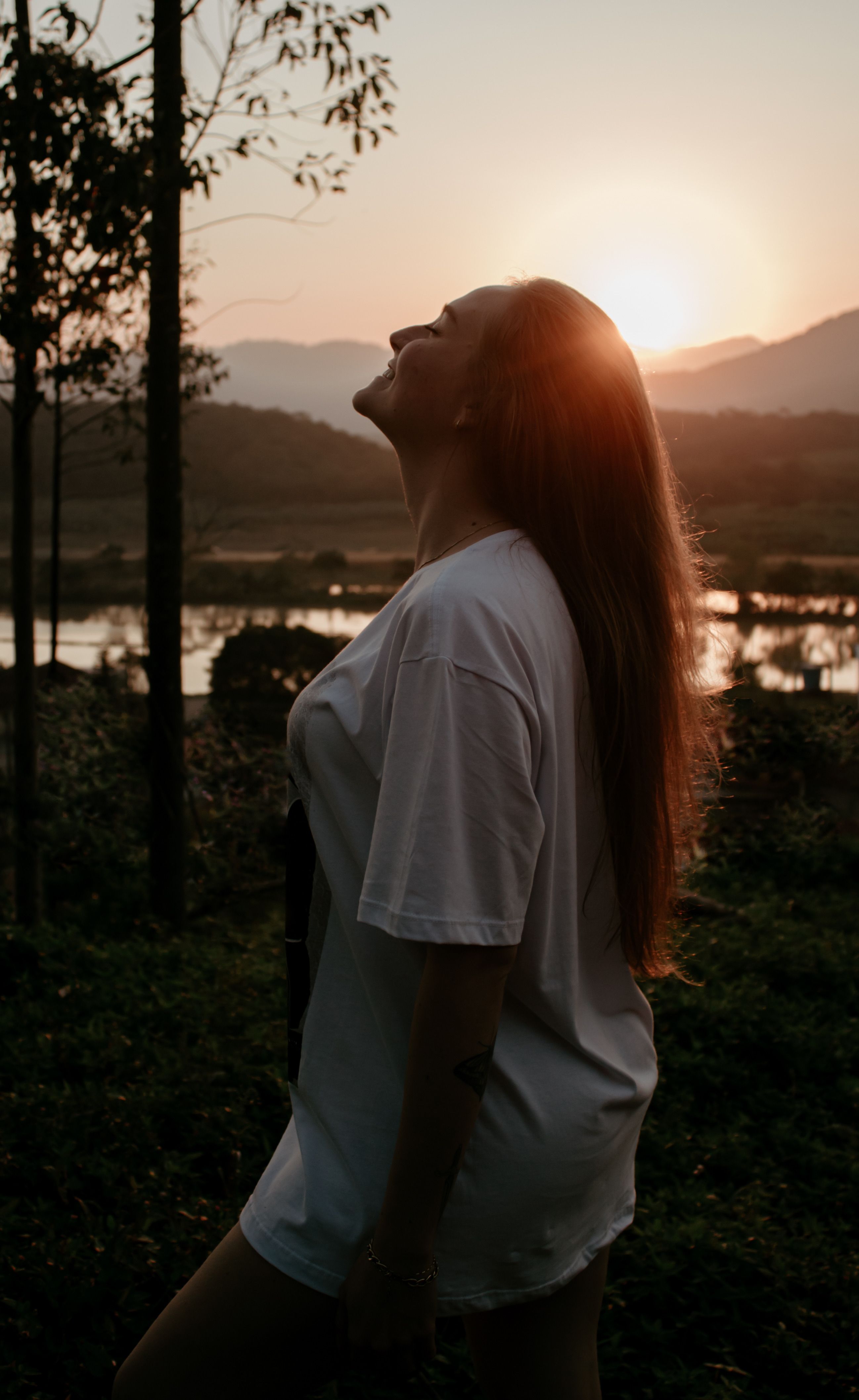 A woman in a calm, reflective moment