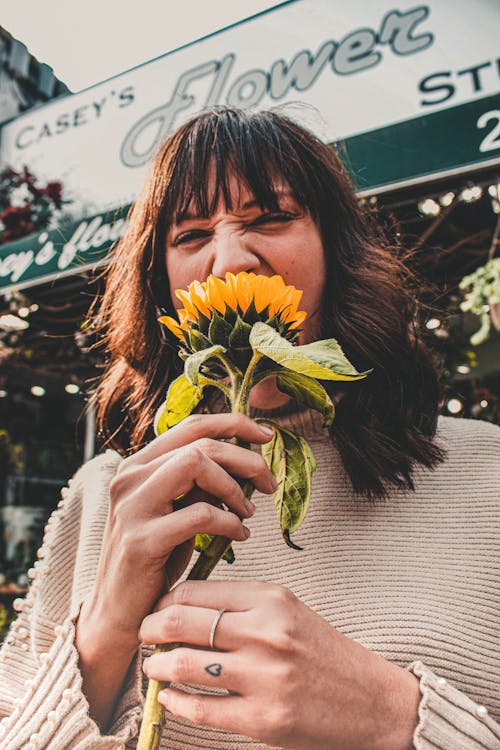 Woman Holding Sunflower