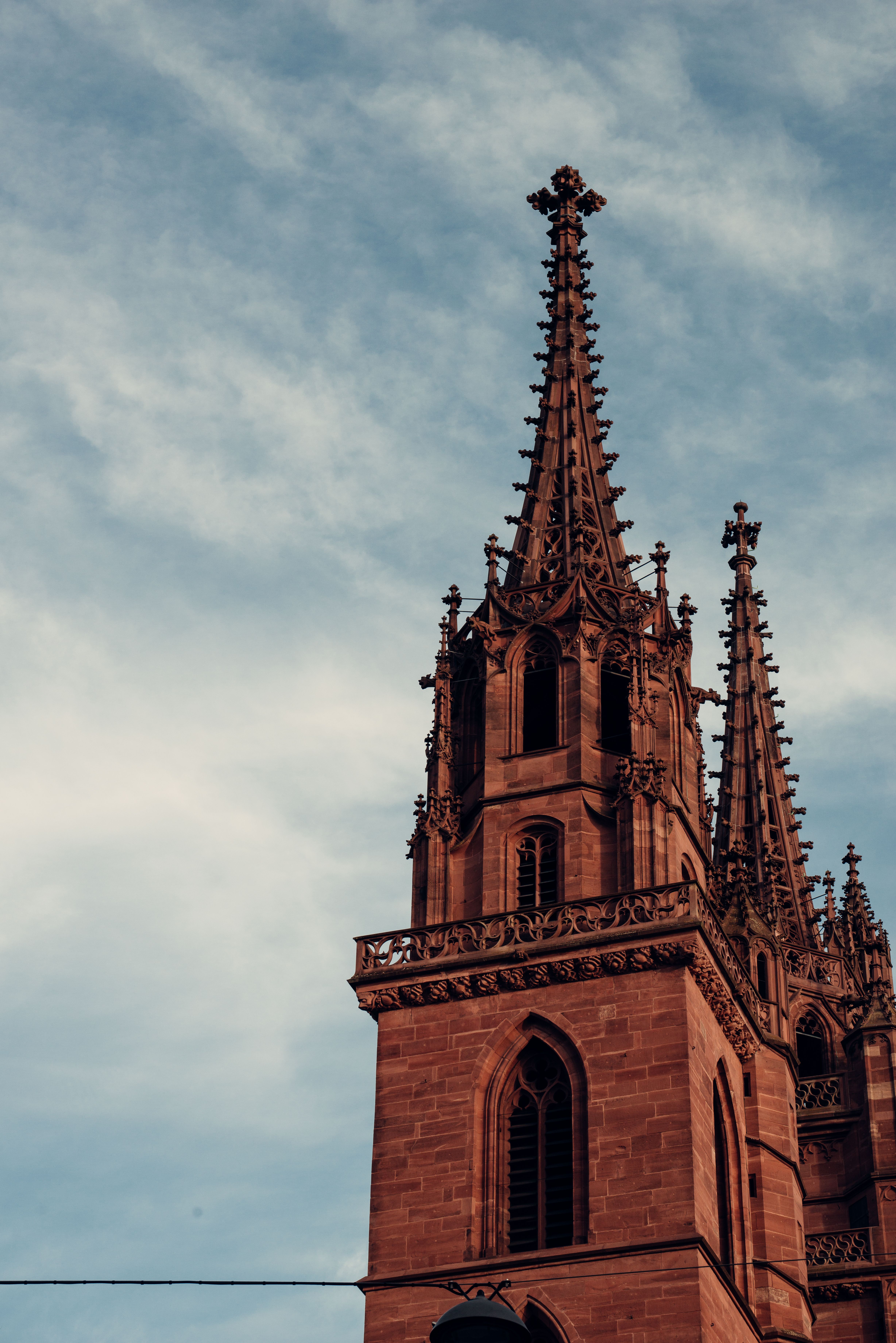 Gothic Spires of Basel Minster Against Blue Sky · Free Stock Photo