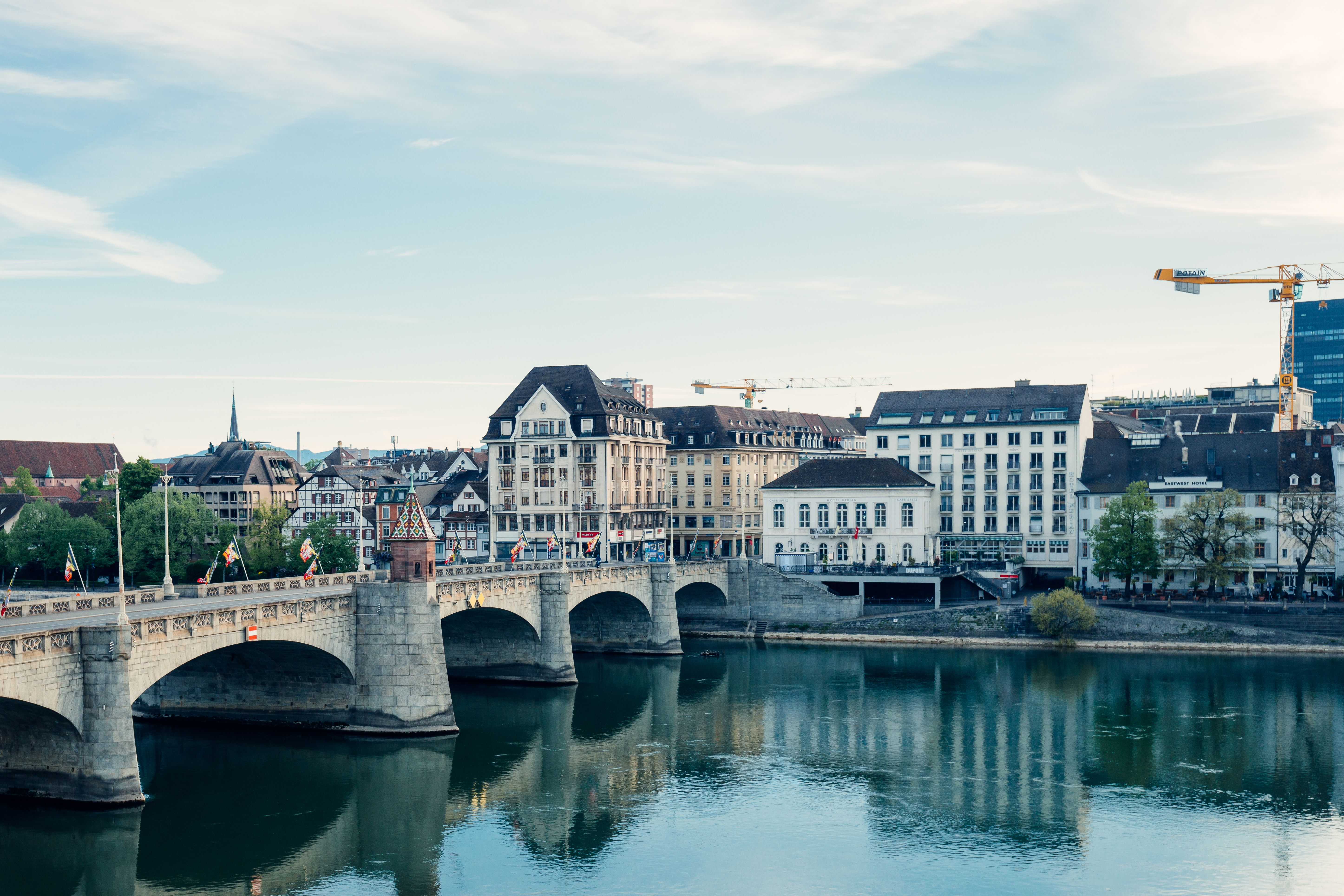 Charming Basel Cityscape by the Rhine River · Free Stock Photo