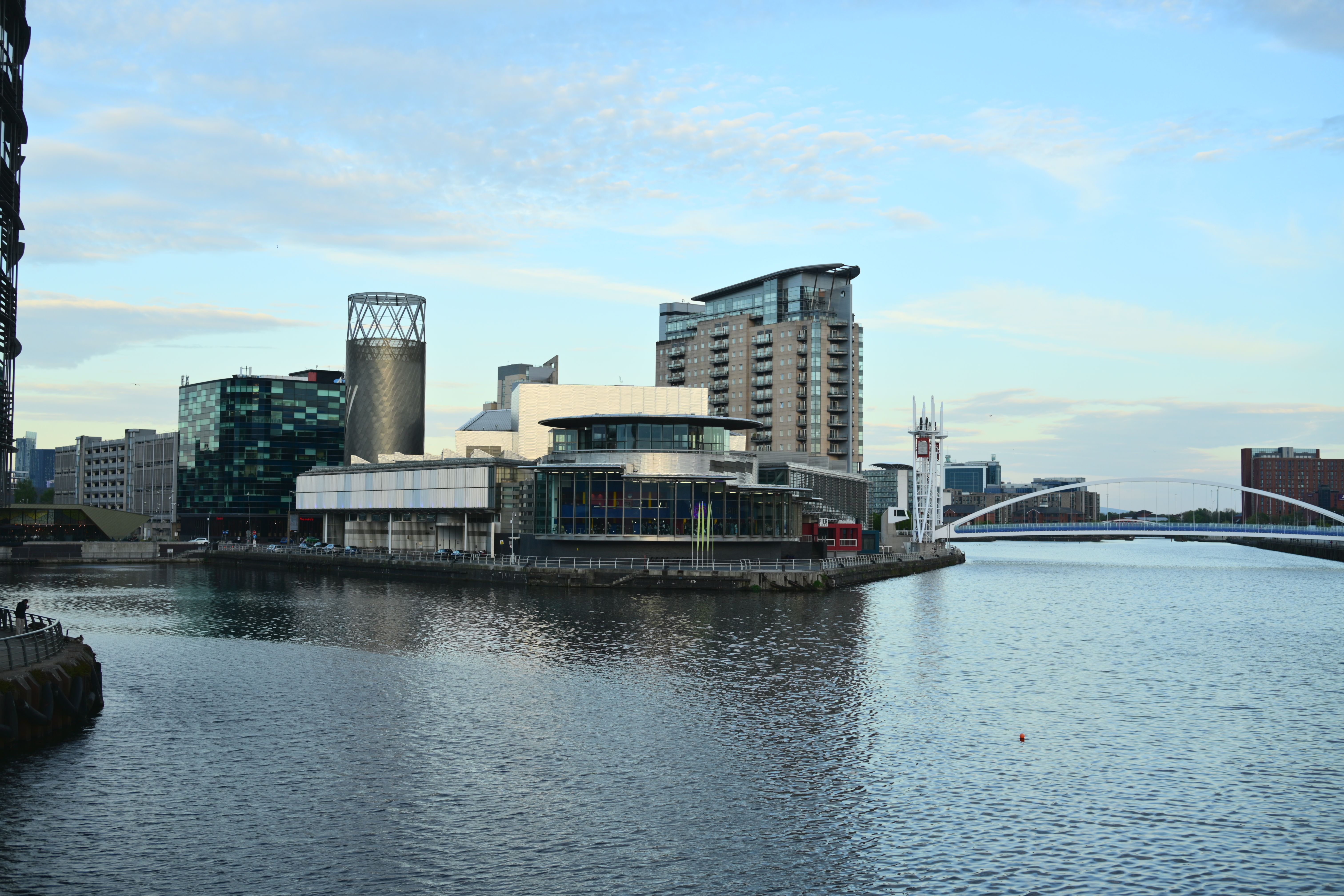 Skyline view of modern architecture along the waterfront in Manchester, UK.