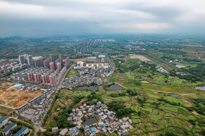 Aerial View of Croplands and Houses · Free Stock Photo