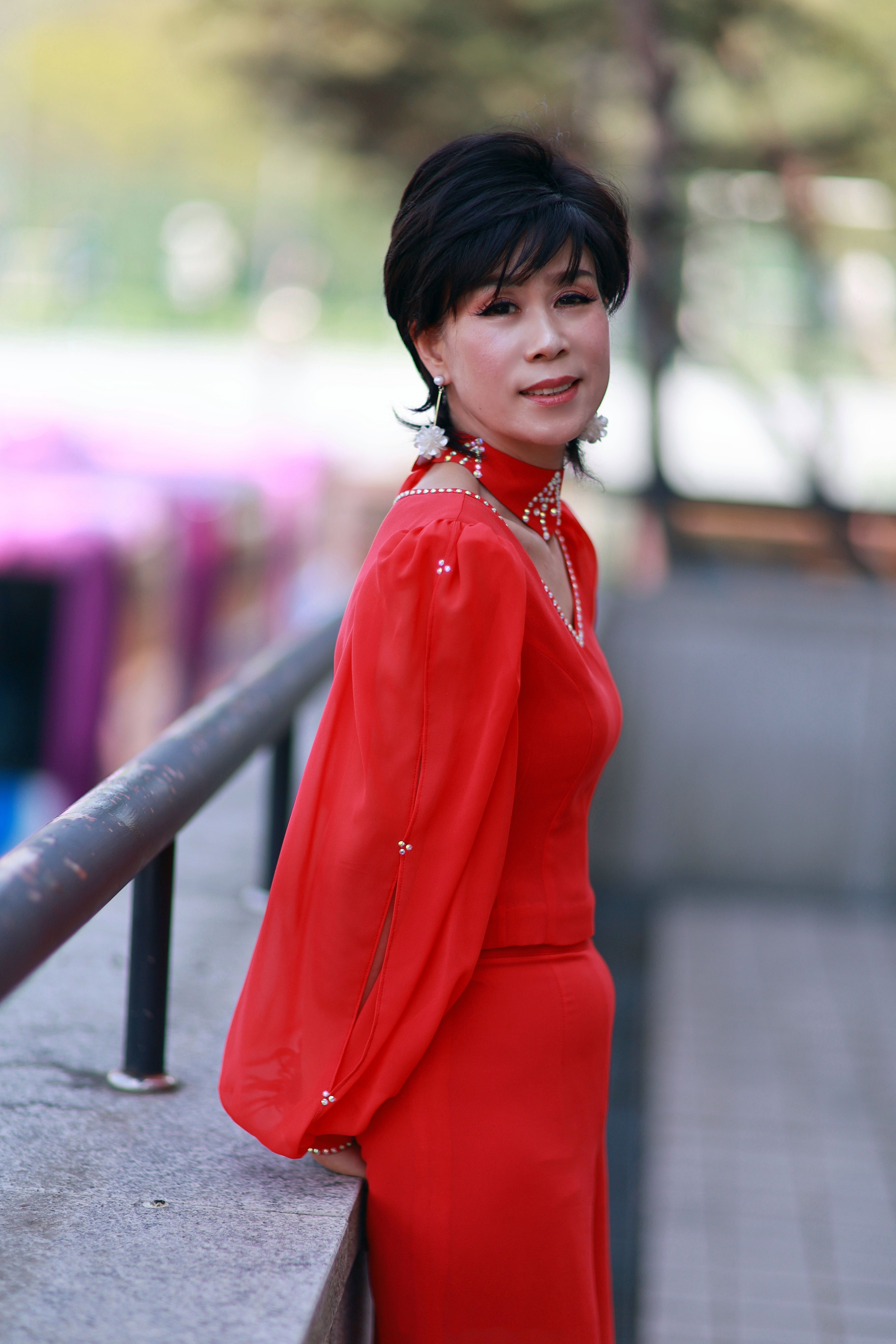 Elegant Woman in Red Dress Outdoors · Free Stock Photo