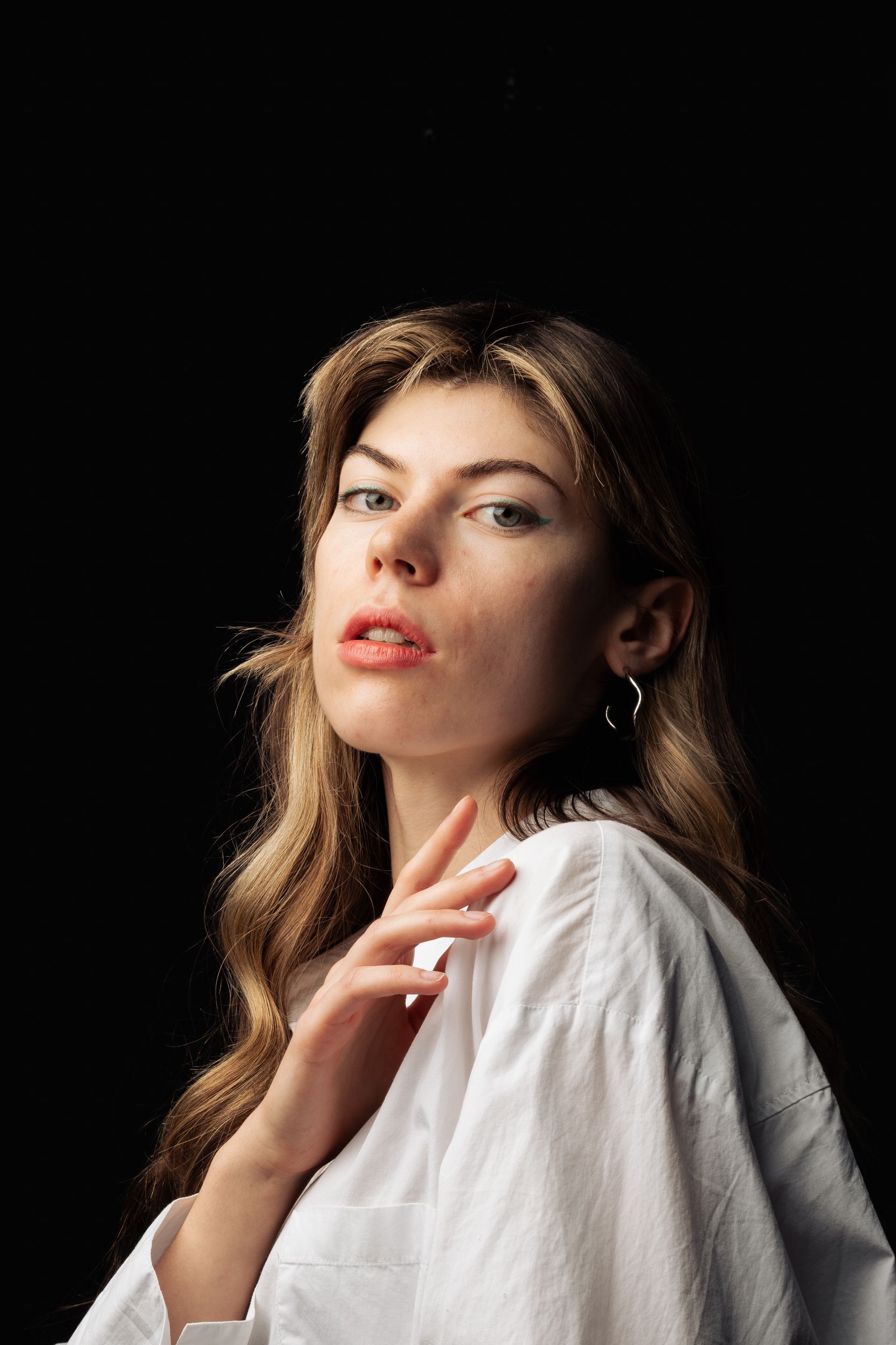 Elegant Portrait of a Young Woman in White Shirt · Free Stock Photo