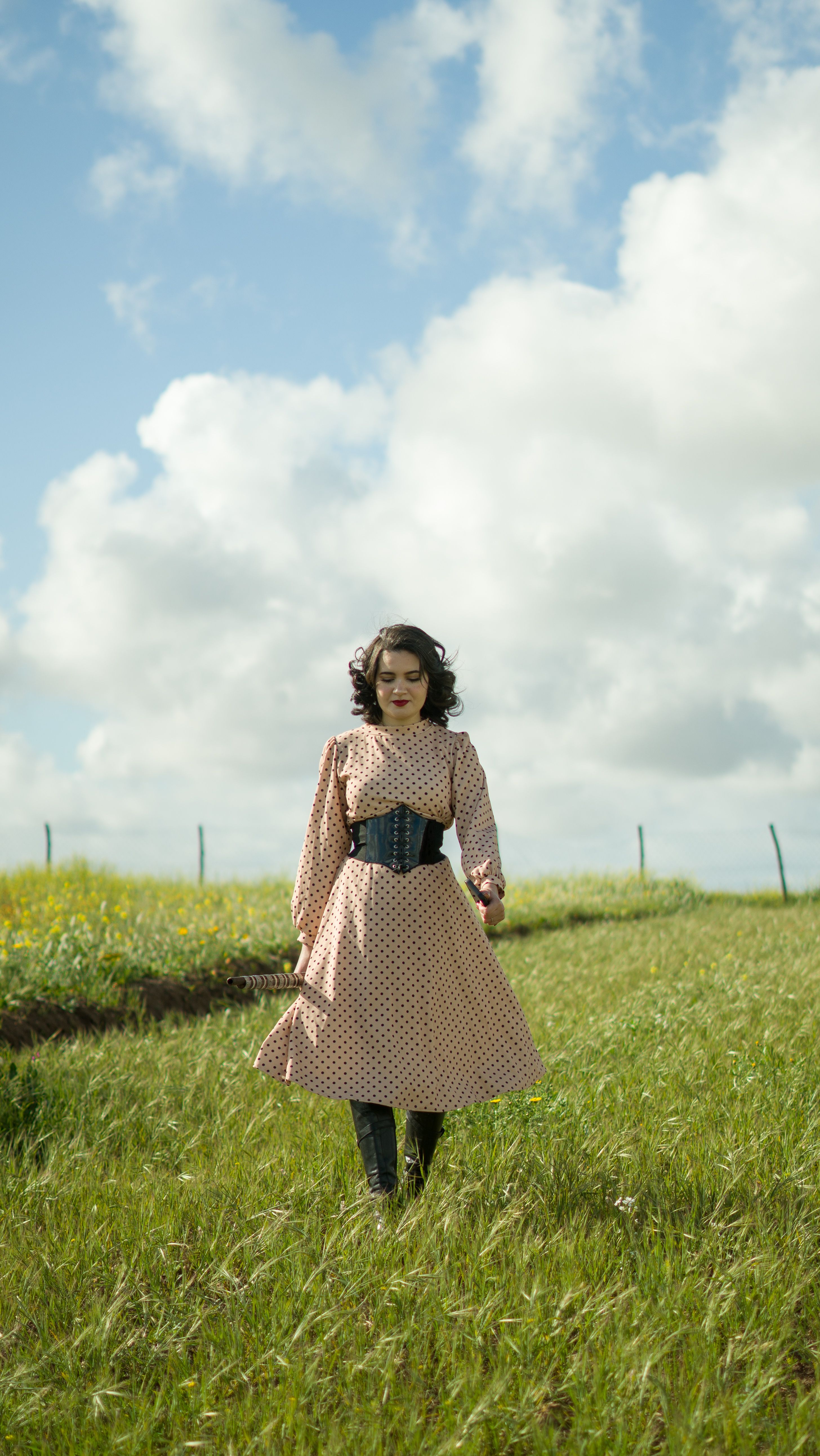 Woman in Vintage Dress Strolling in Meadow  Free Stock Photo