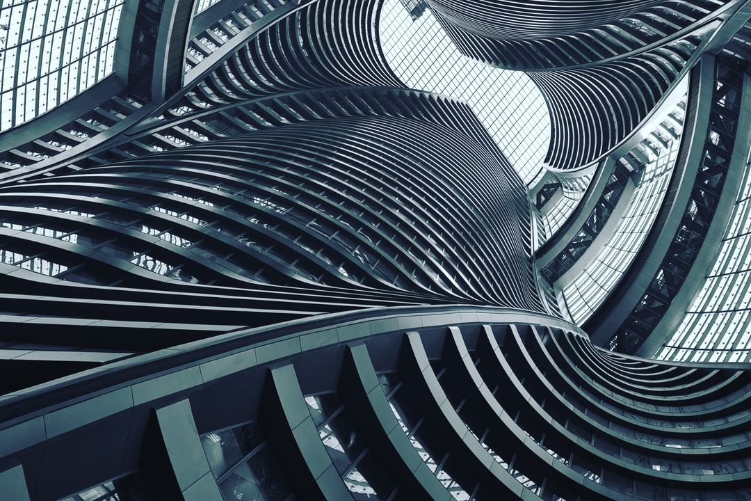 Low-angle Photography of Gray Spiral Building