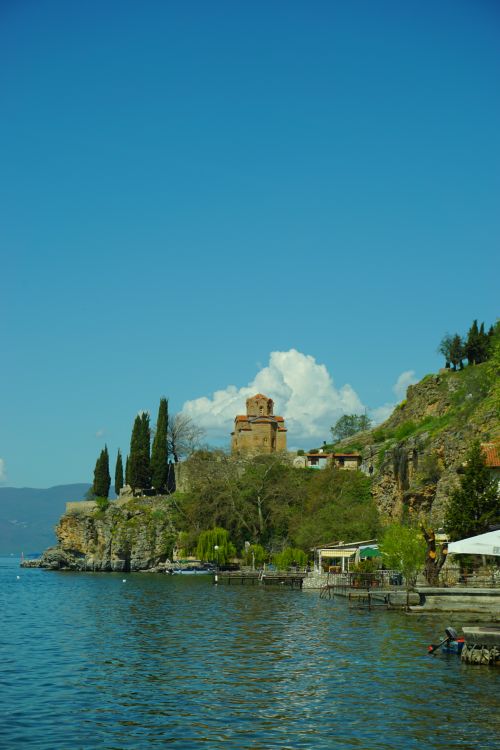Free Beautiful summer view of Lake Ohrid and the Church of St. John at Kaneo in North Macedonia. Stock Photo
