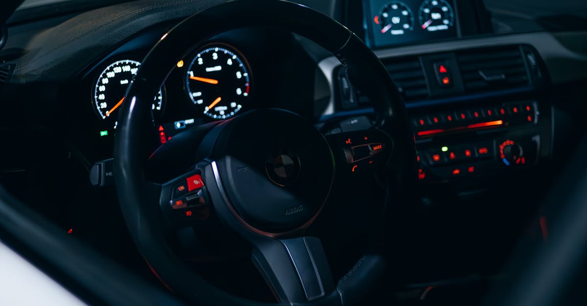Luxury Car Interior with Futuristic Dashboard Lighting · Free Stock Photo