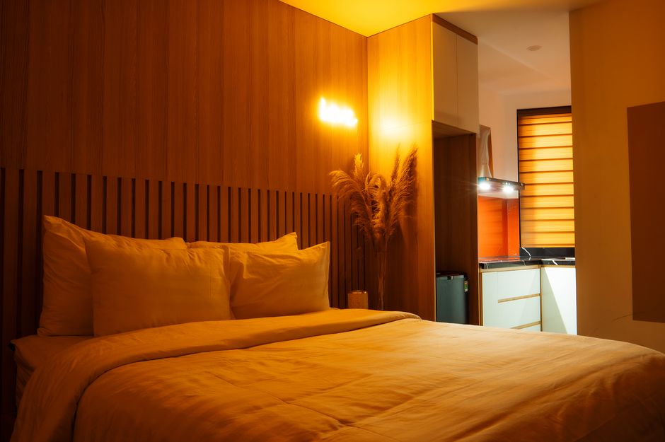 How can I separate the bedroom from the rest of the space with studio loft decorating ideas?