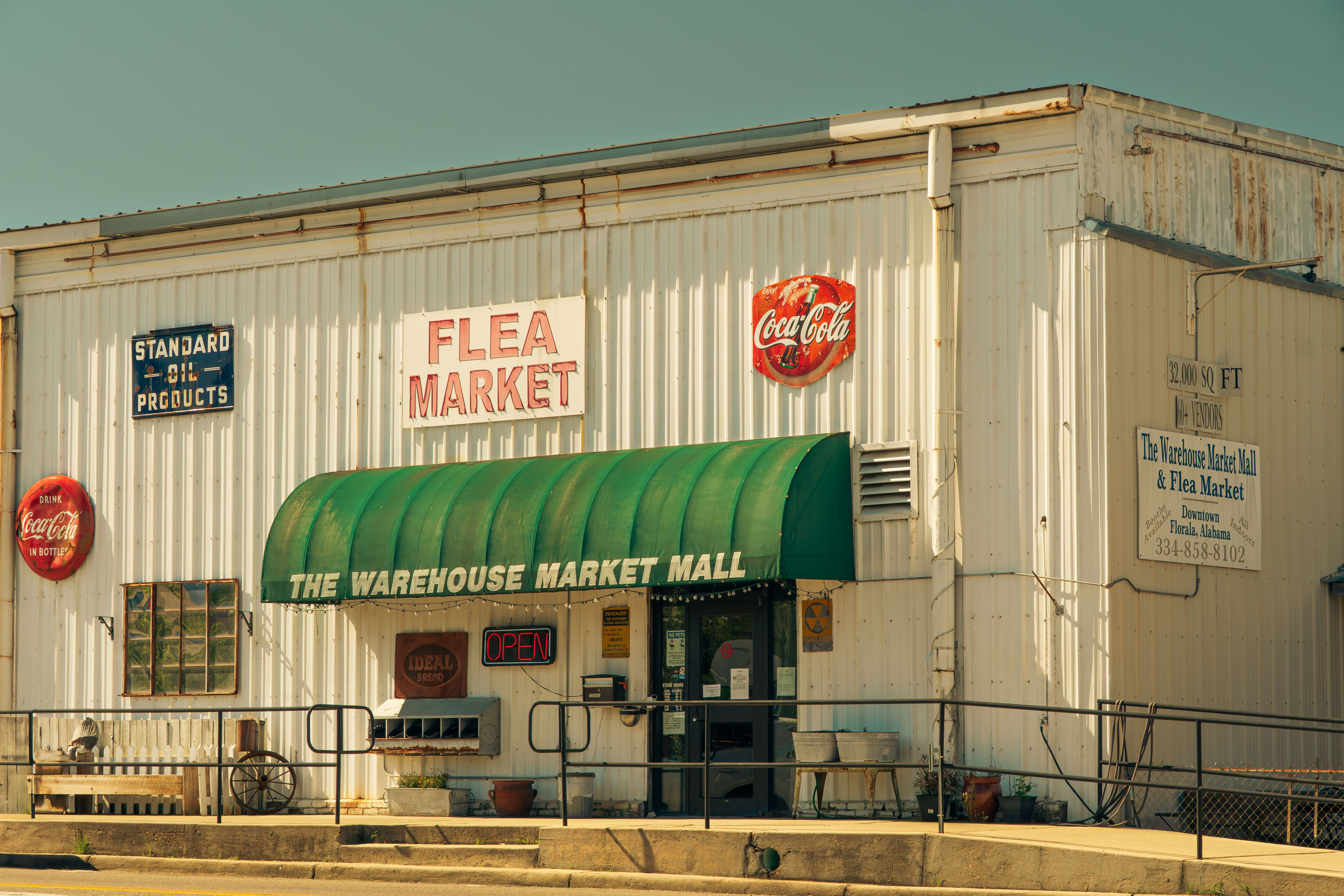 A retro flea market storefront in Alabama with vintage signage and classic design.