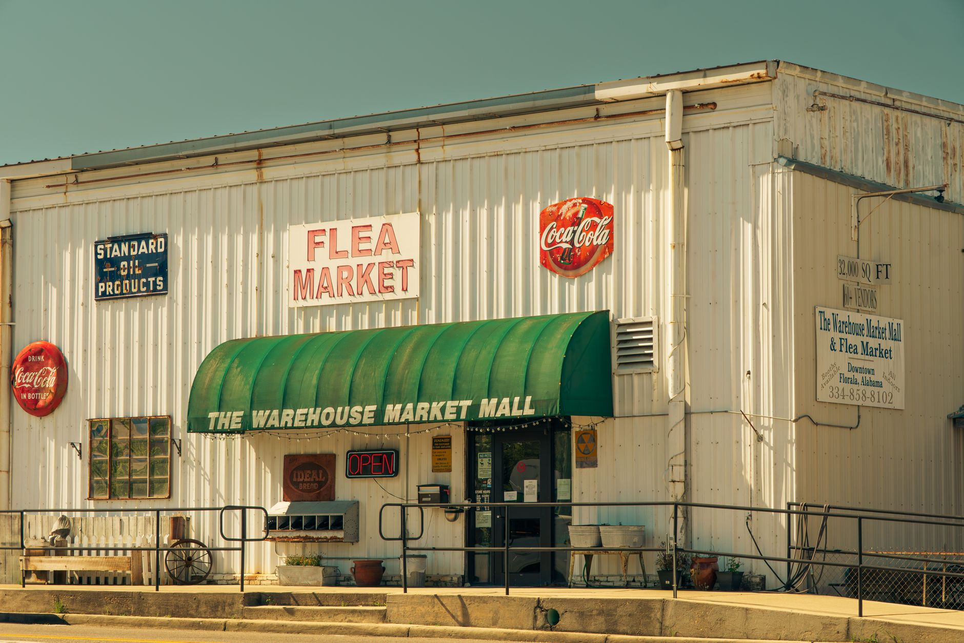A retro flea market storefront in Alabama with vintage signage and classic design.
