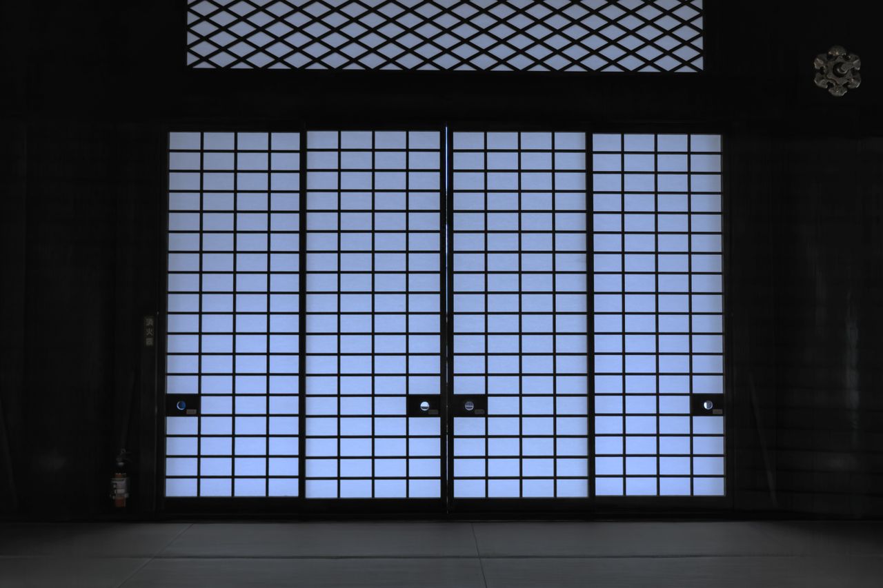 elegant view of a traditional japanese shoji door with soft lighting c