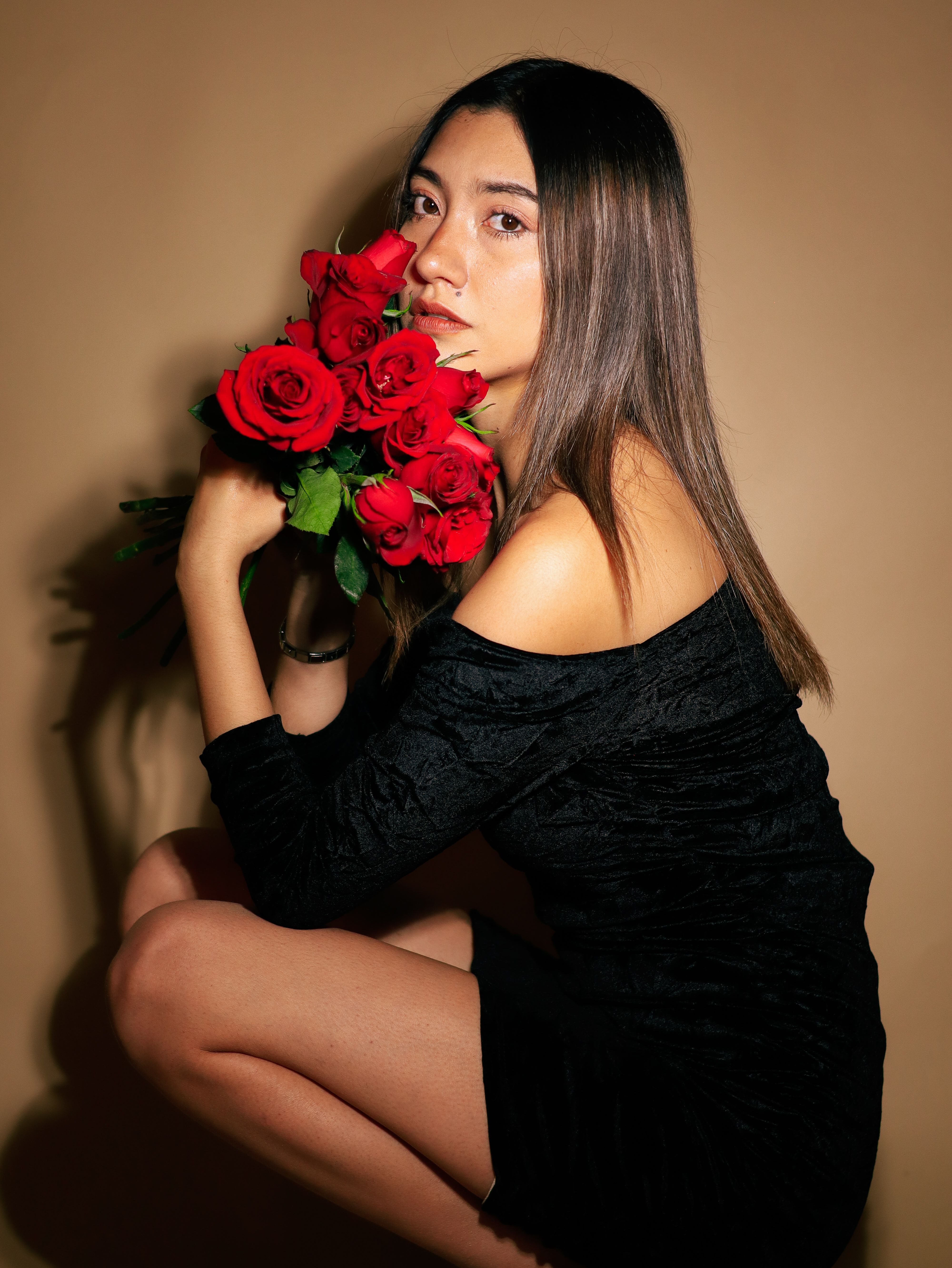 Elegant Portrait of Woman with Red Roses · Free Stock Photo