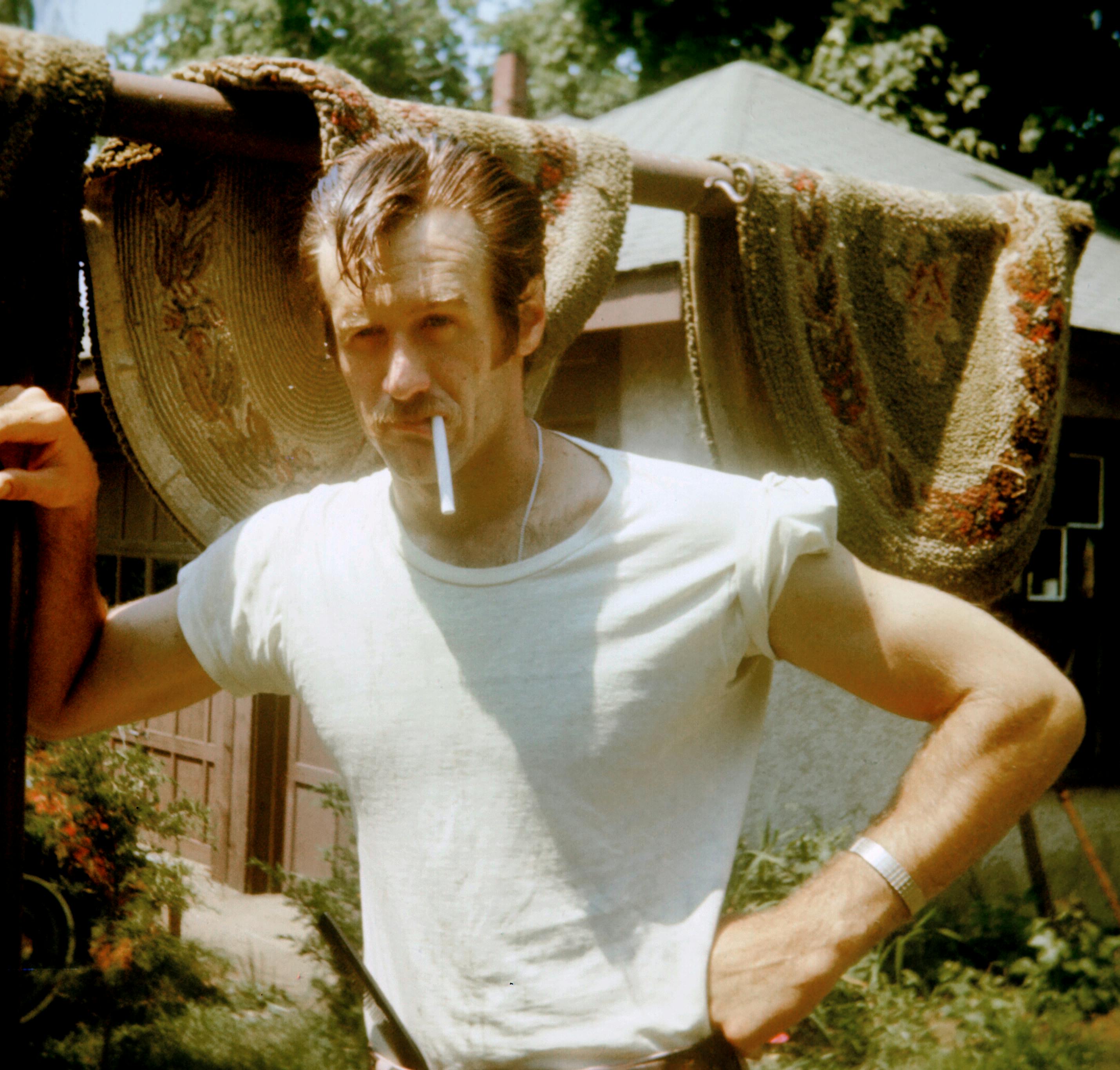 photo of man smoking cigarette