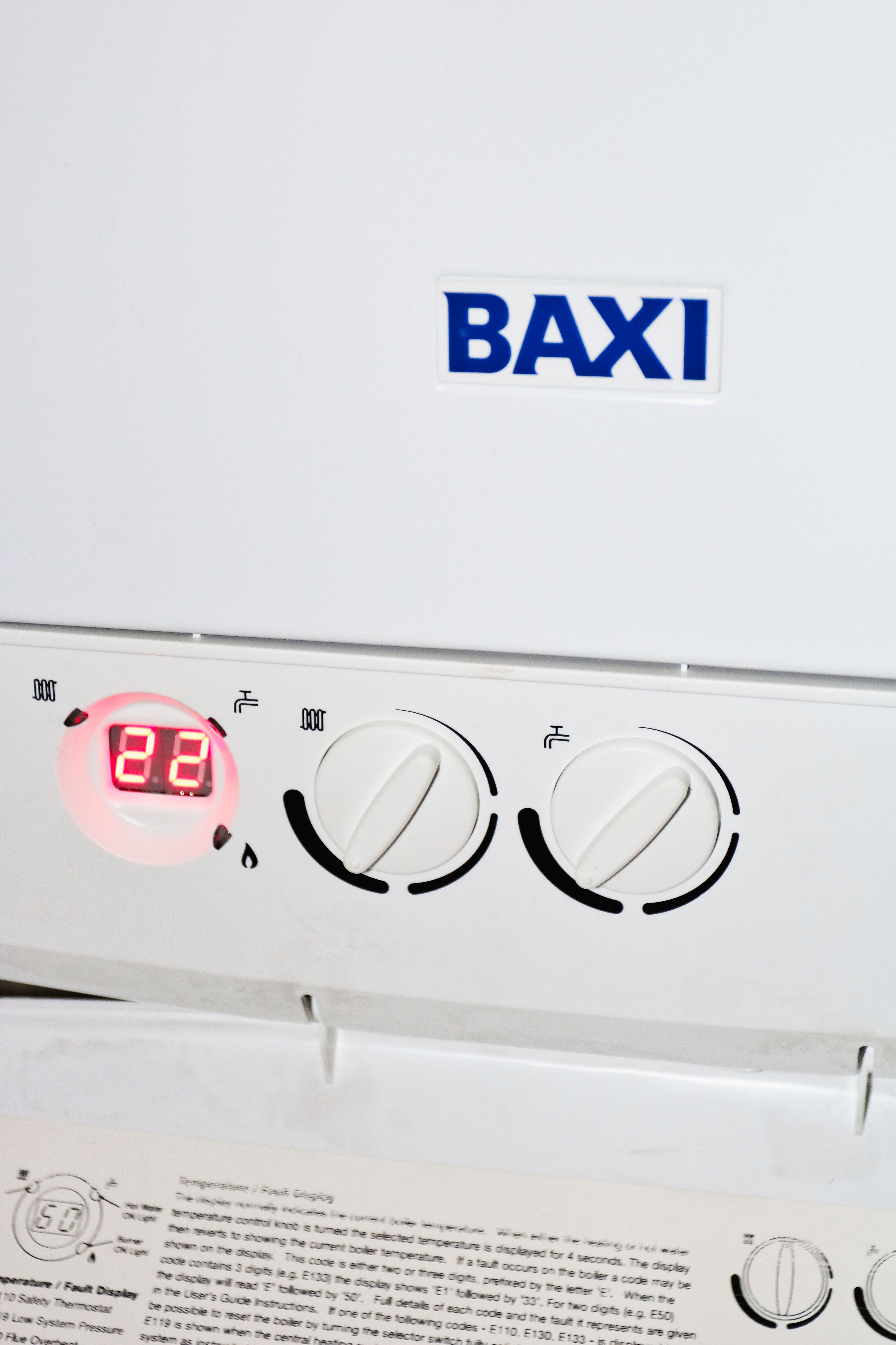 Residential boiler system with central heating and hot water controls