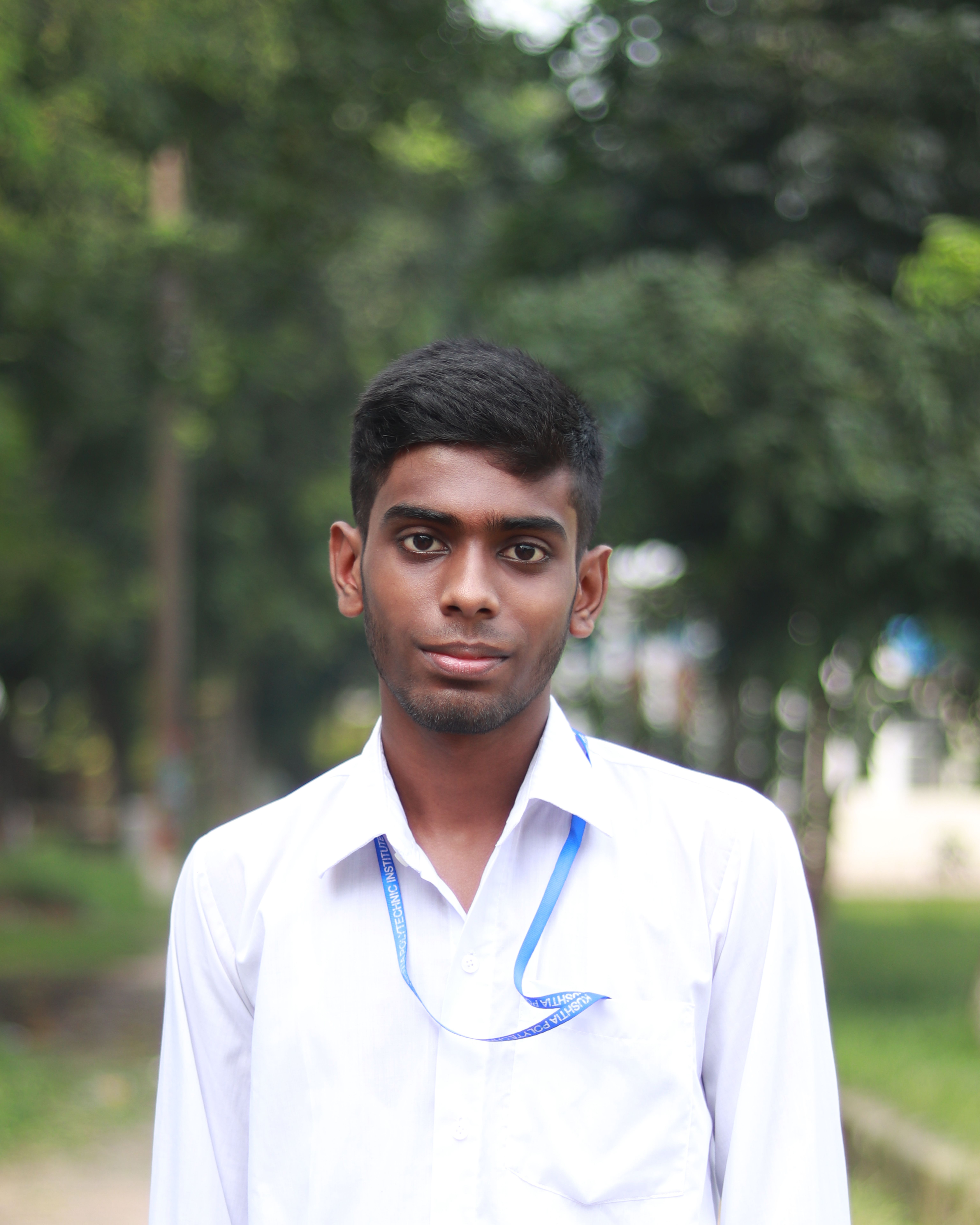 Portrait of a South Asian teenager outdoors in Khulna Division, Bangladesh.