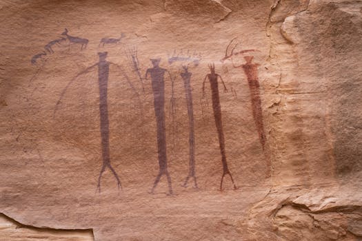 Explore ancient petroglyphs on sandstone cliffs in Utah, USA, showcasing rock art.