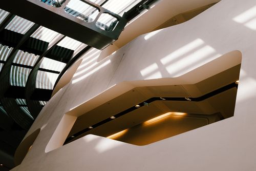 Free Stylish abstract architectural interior with vivid natural light and geometric patterns. Stock Photo