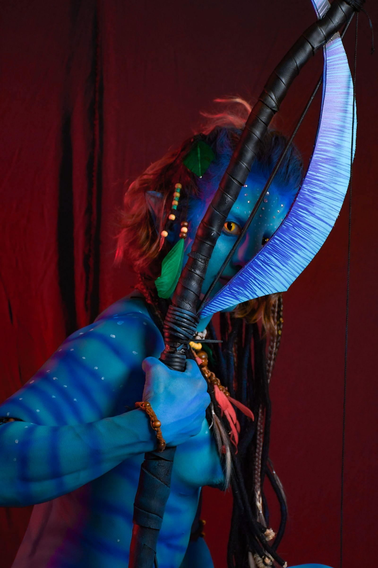 Blue Alien Cosplay with Bow and Arrow · Free Stock Photo