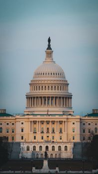 Majestic image of the United States Capitol building in Washington, DC, captured at dusk.