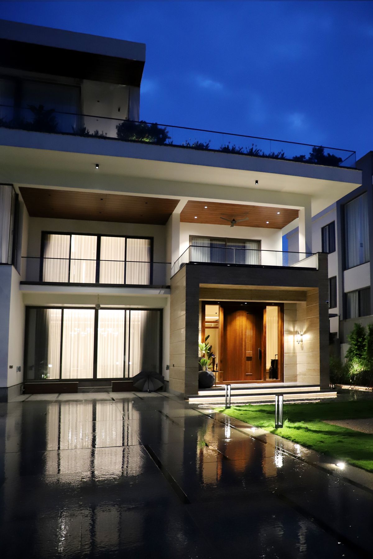 Modern luxury house illuminated at night