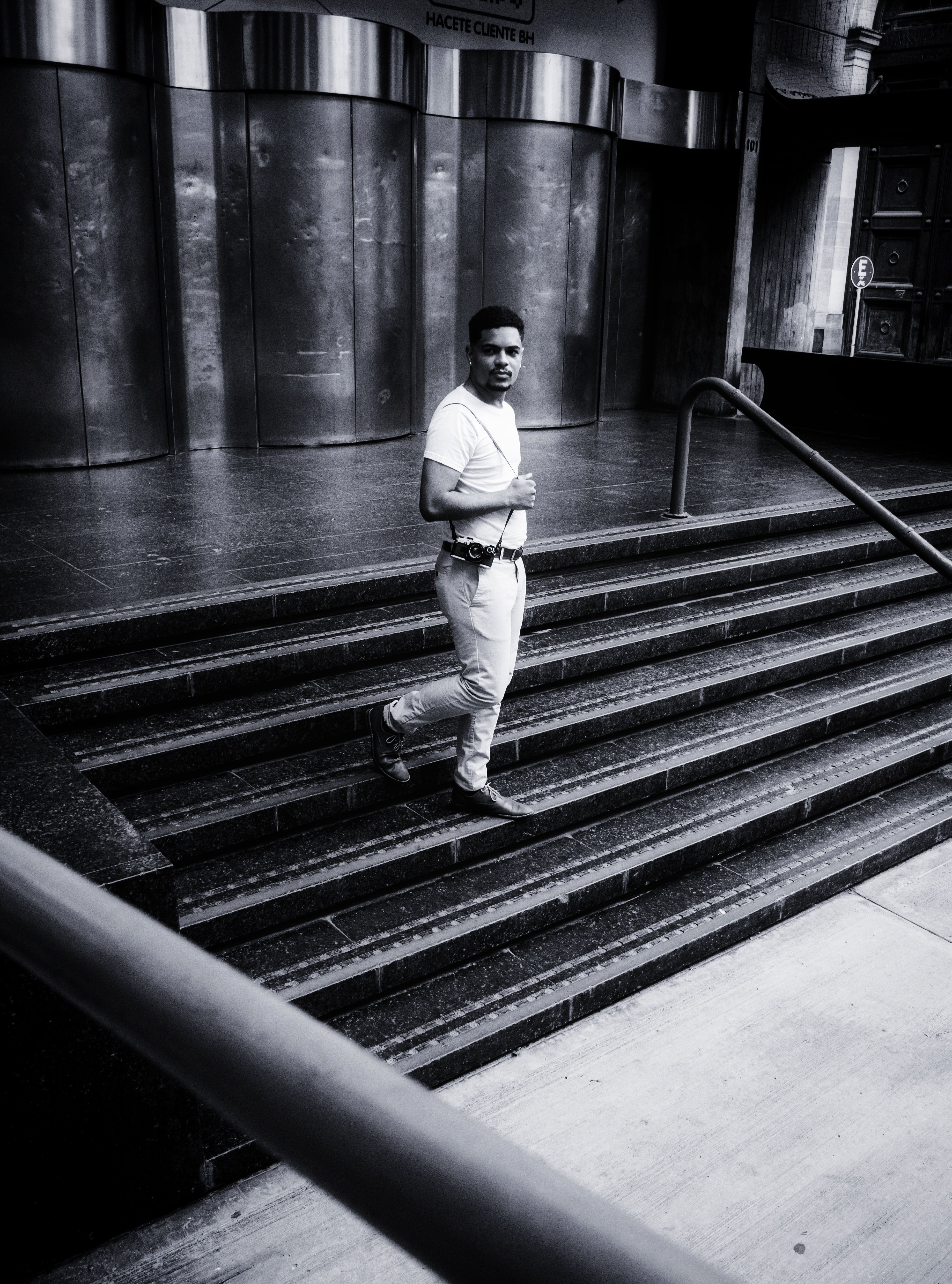 Man Descending Urban Stairs in Contemporary Setting · Free Stock Photo