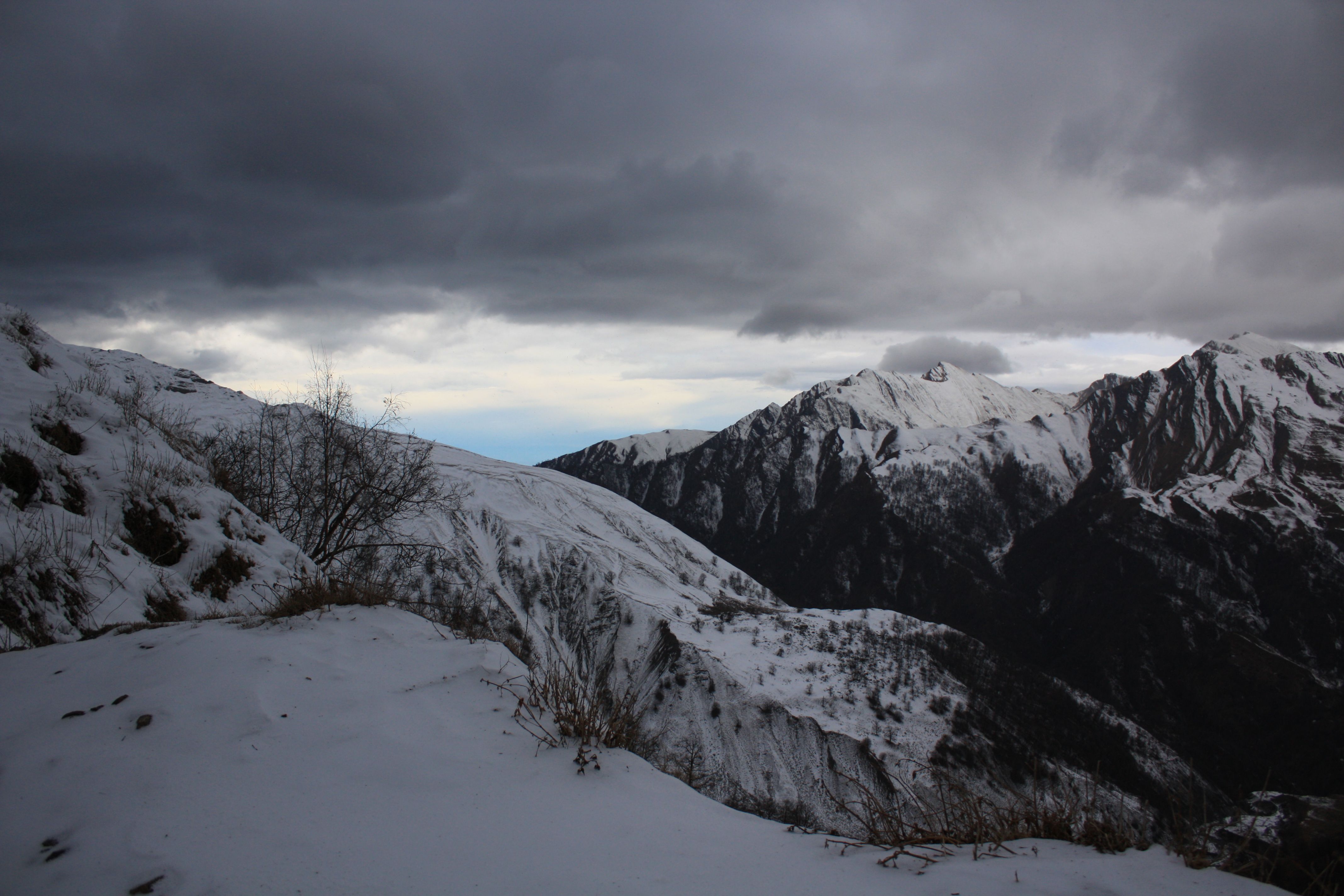 Dramatic Snow-Covered Mountain Landscape · Free Stock Photo