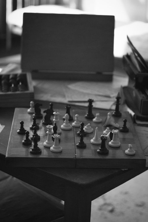 Free Black and white chessboard with pieces in a strategic game setting, offering a classic feel. Stock Photo