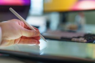 Stylus on a drawing tablet in a home studio — photo by Jakub Zerdzicki on Pexels