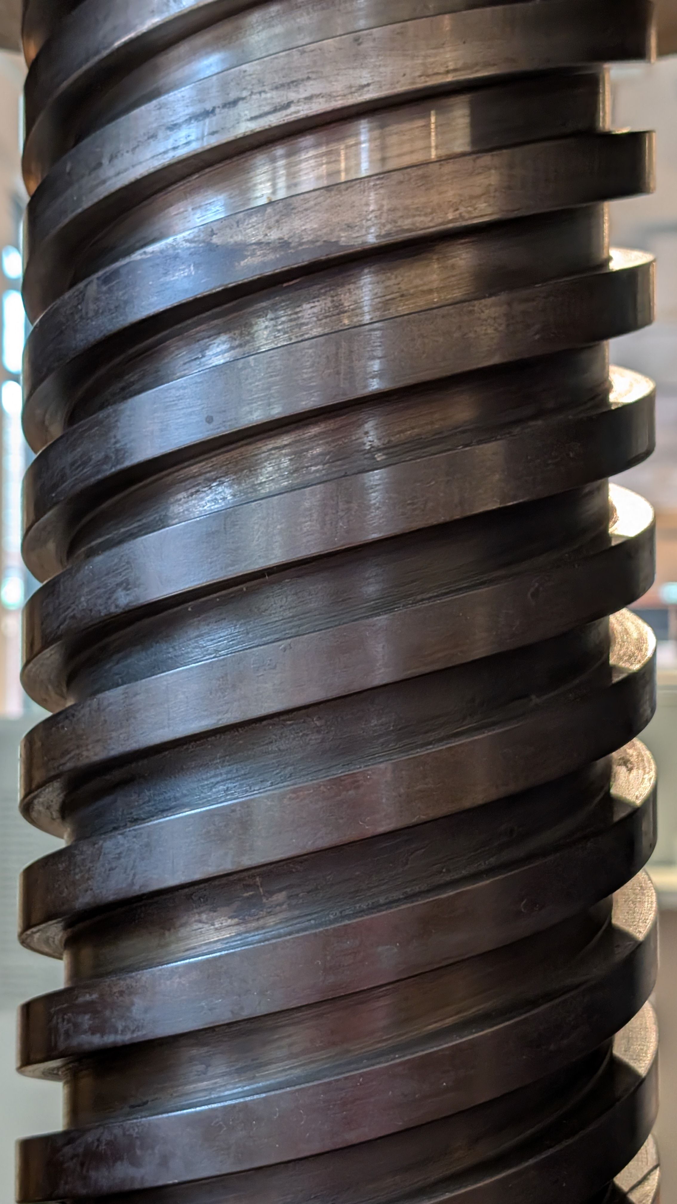 Close-Up of Industrial Steel Spindle in Factory · Free Stock Photo