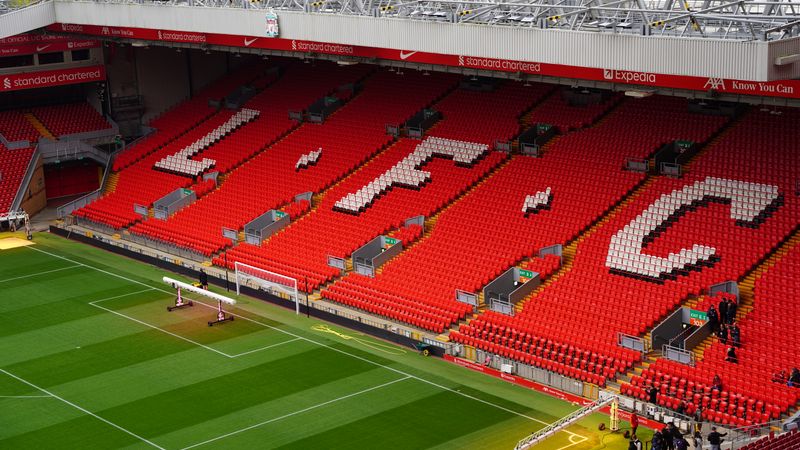 View of Anfield Stadium seating with prominent LFC letters. Perfect capture of iconic Liverpool FC venue.