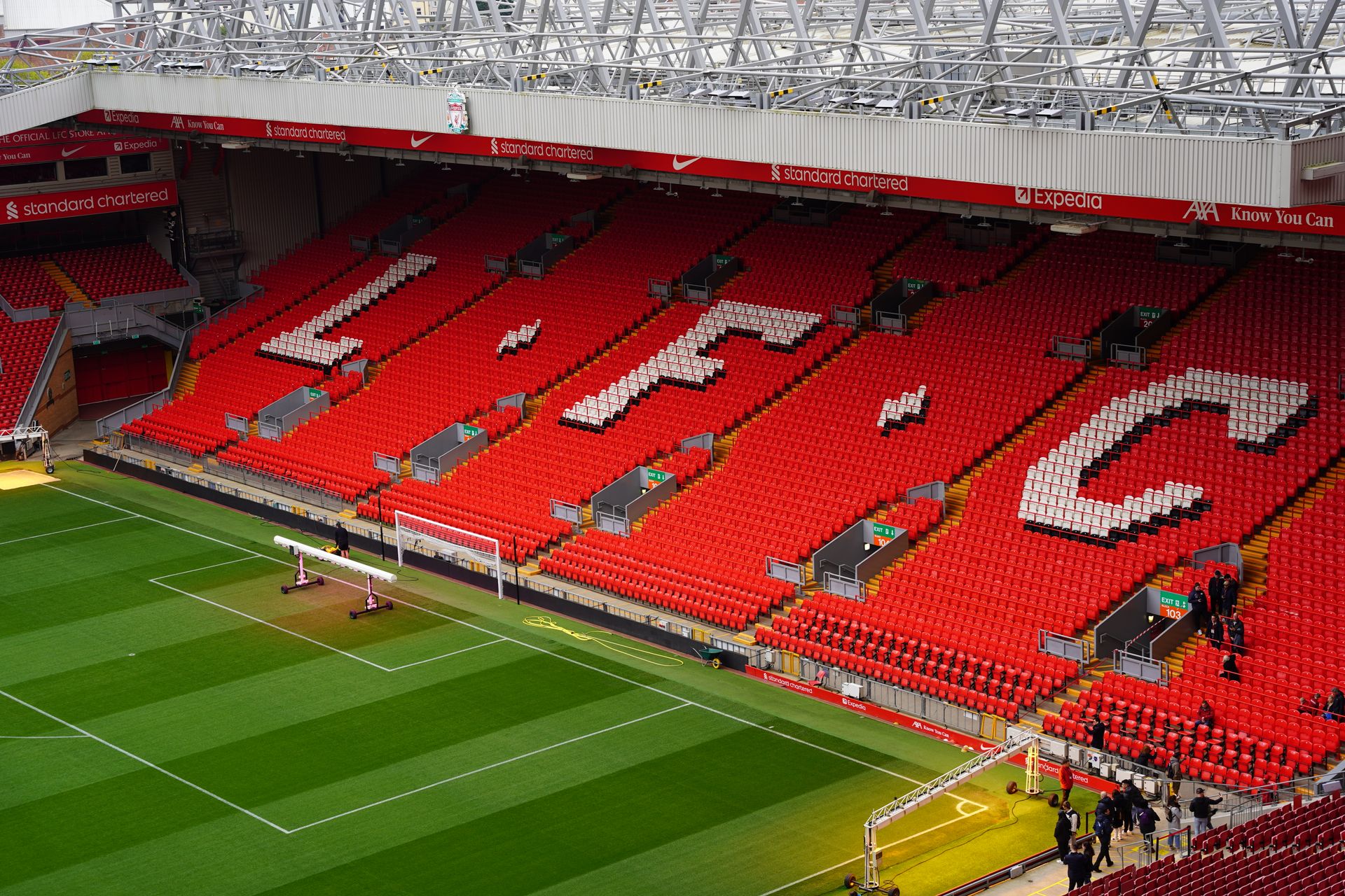 The empty stands of a football stadium in daylight
