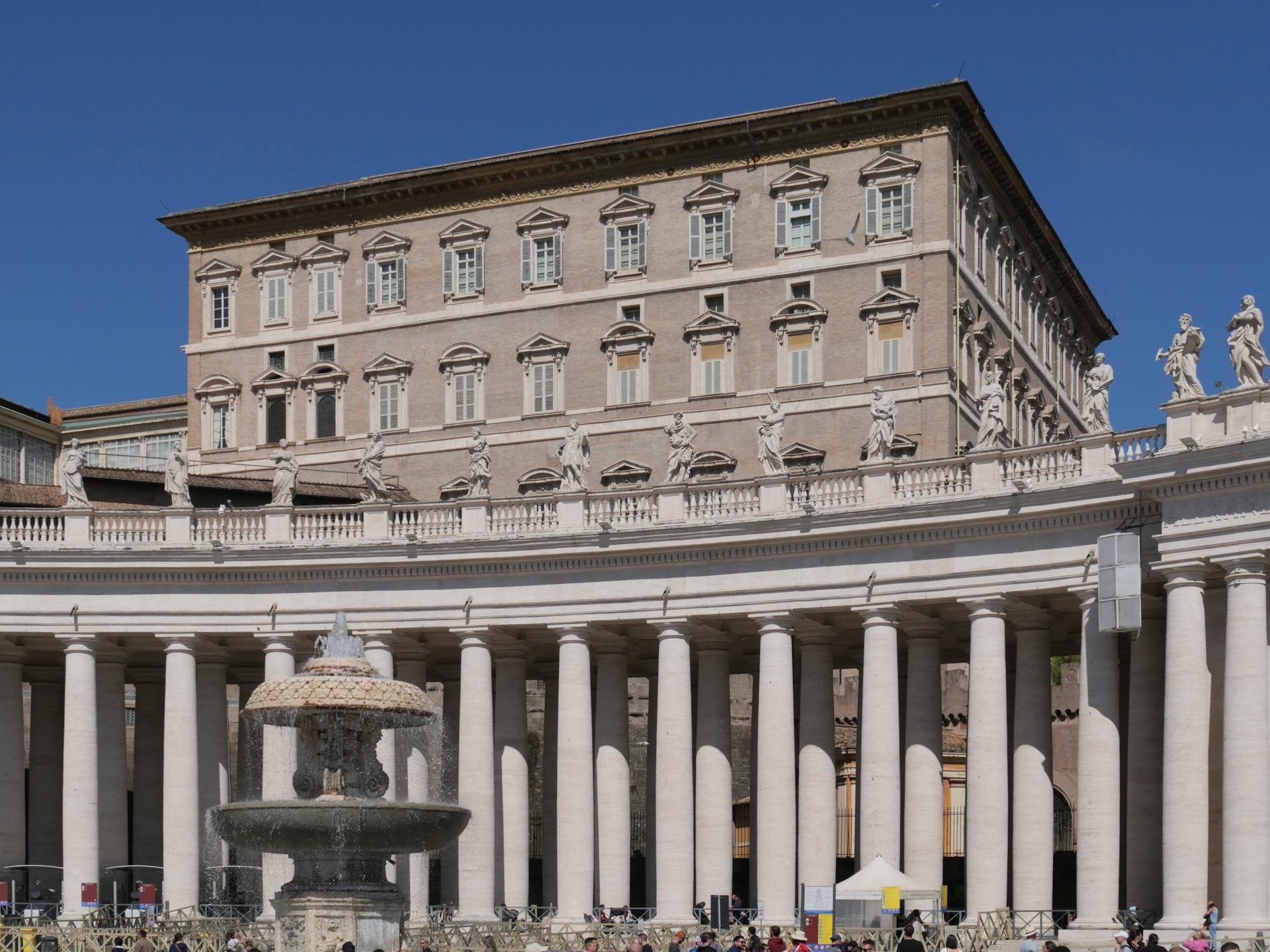 View of the Apostolic Palace and colonnade at St. Peter's Square in Vatican City.