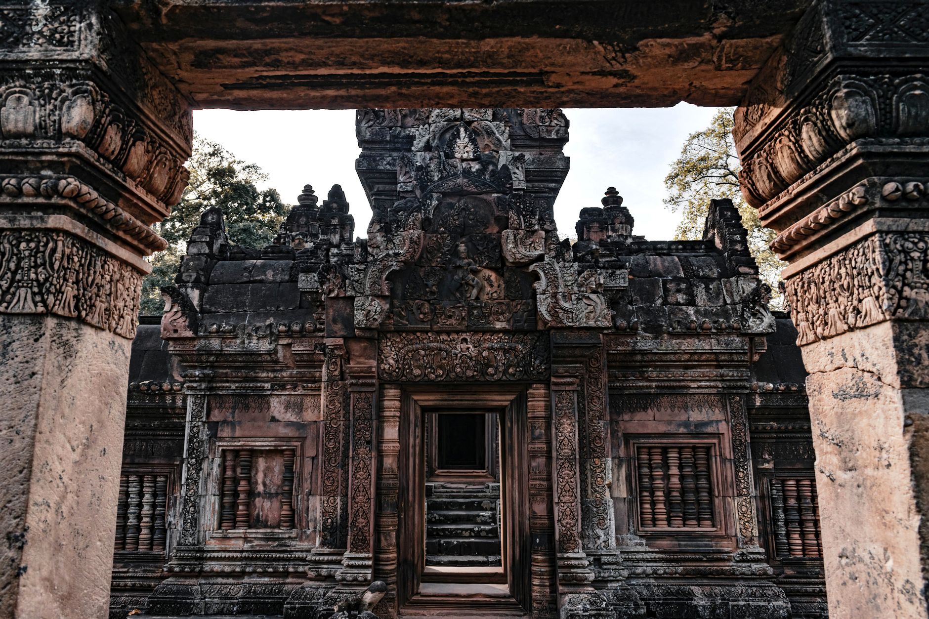 Explore the intricate carvings of a historic temple in Siem Reap, Cambodia.