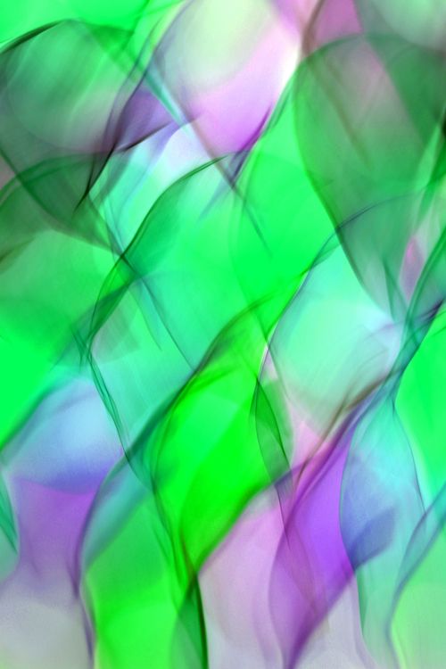 Free Vibrant abstract waves of light in purple and green create a dynamic and colorful visual experience. Stock Photo
