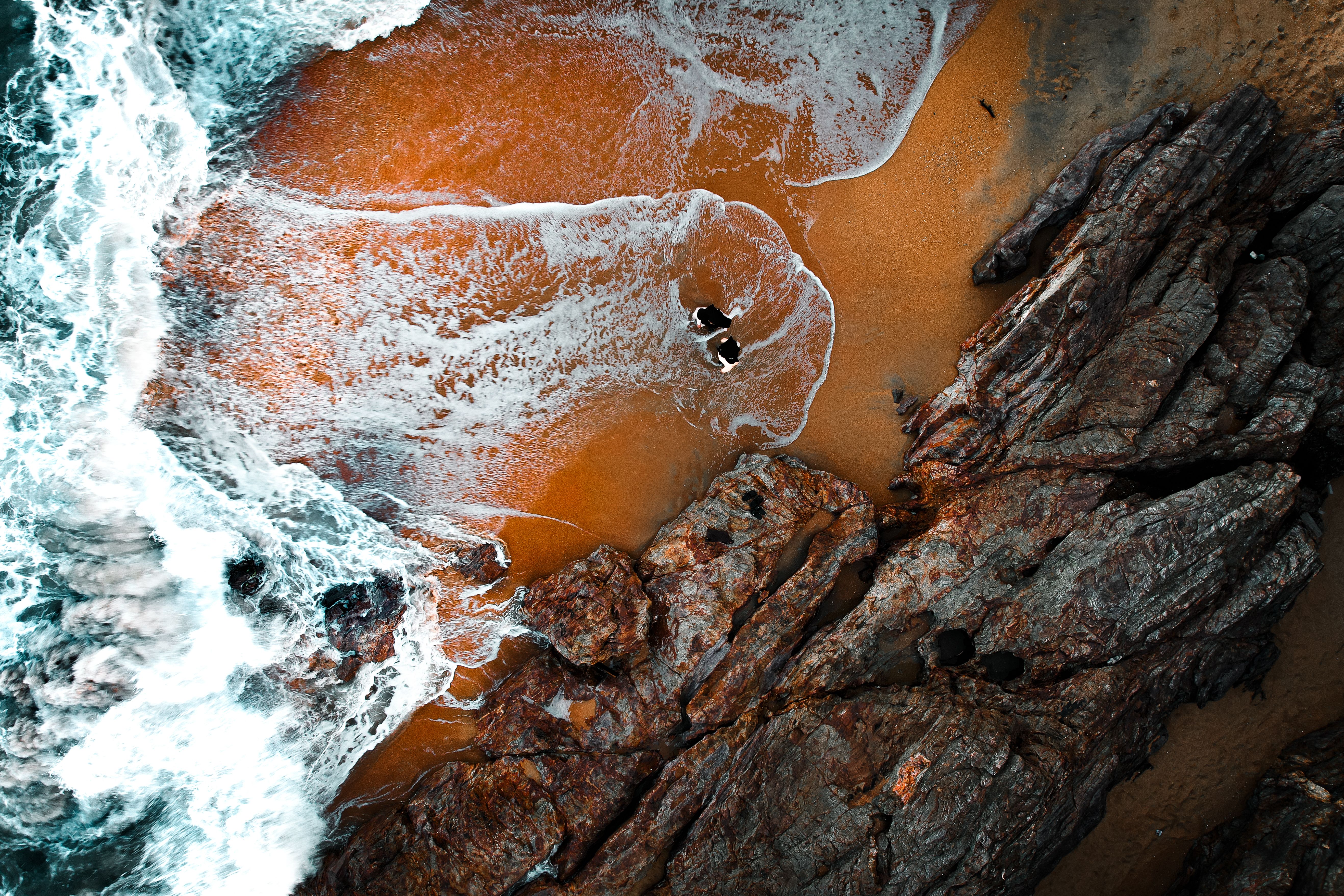 Aerial Beach View with Waves and Rocks · Free Stock Photo