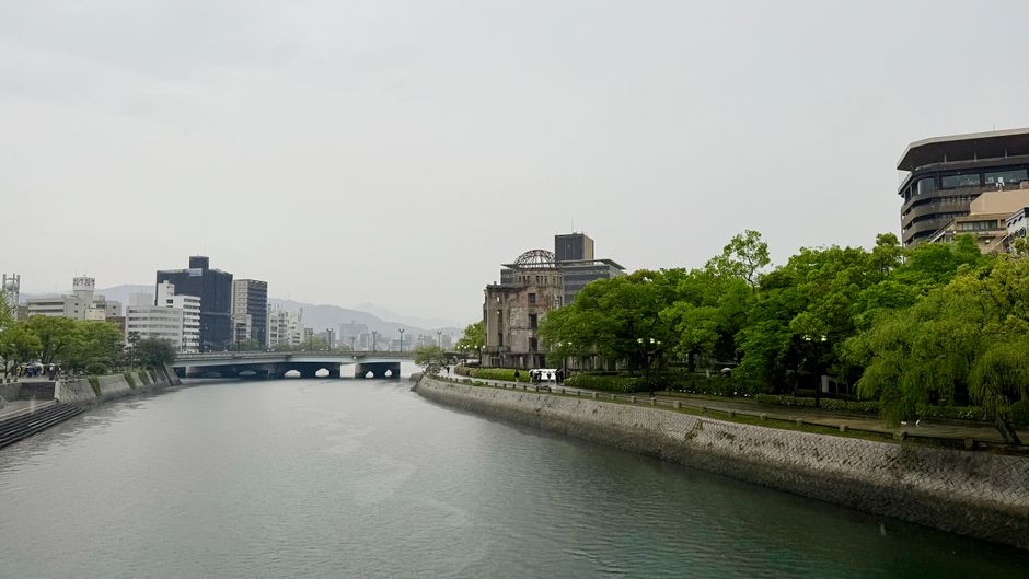 View of Hiroshima's Peace Memorial Park and river during the day.