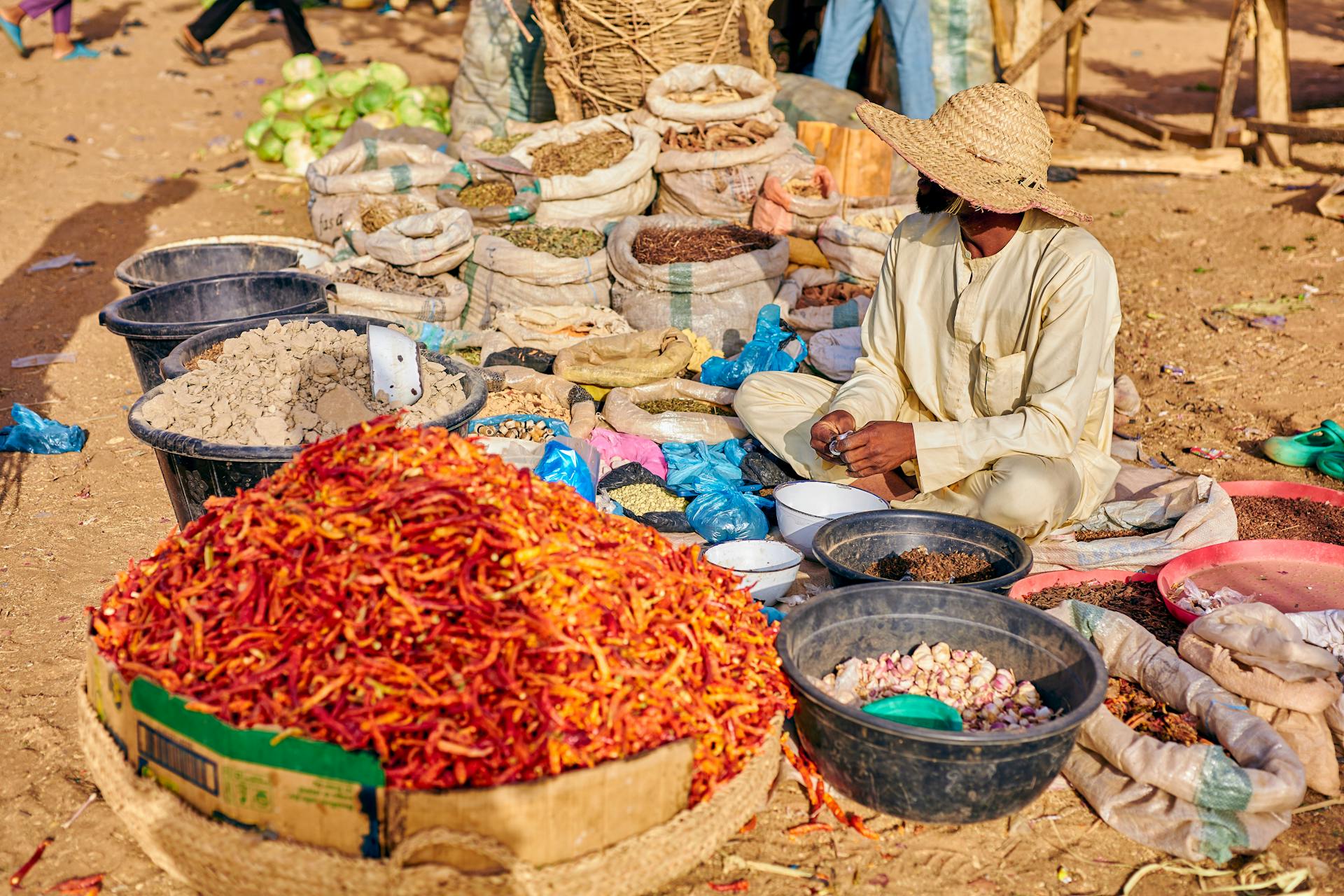An Elderly Man selling Local Remedies