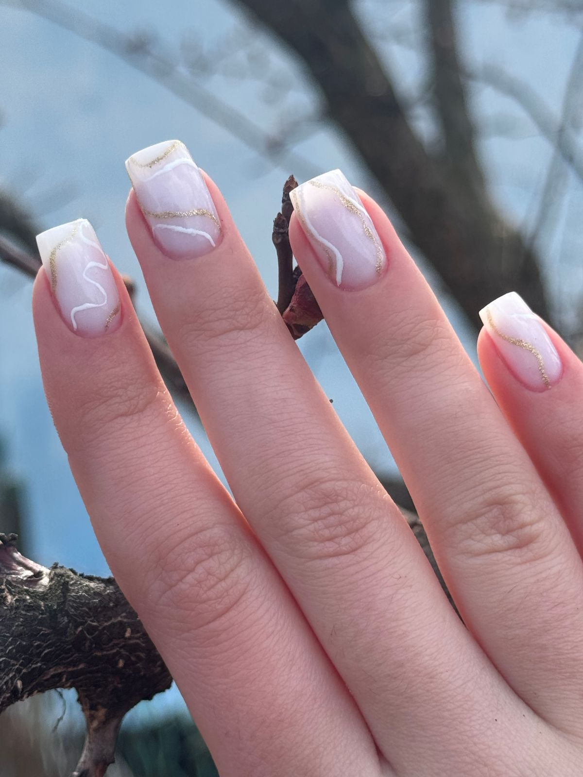 Gold accent nails quiet luxury