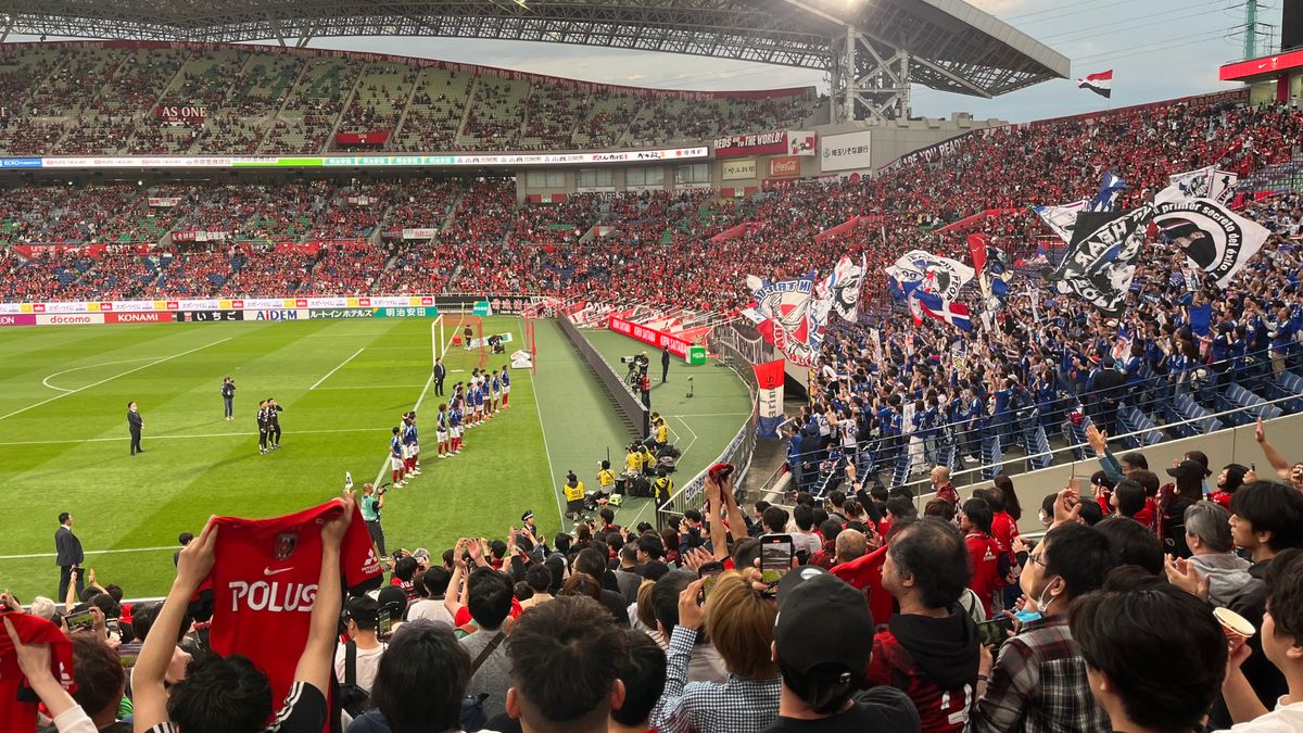 A packed soccer stadium filled with fans during a match