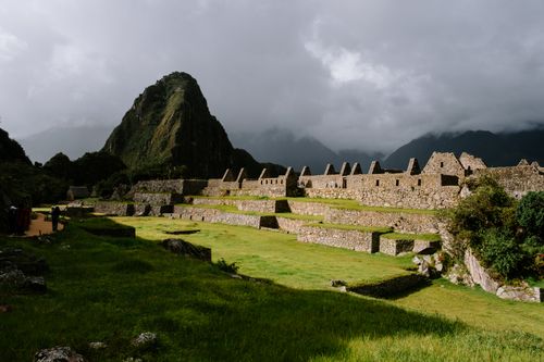 Free Explore the ancient Inca ruins of Machu Picchu nestled in the Andes Mountains with breathtaking views. Stock Photo