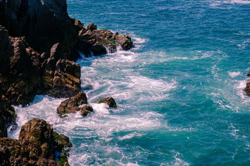 Free Vibrant coastal landscape of Maruata, Michoacán, showcasing rocky cliffs and turquoise sea. Stock Photo