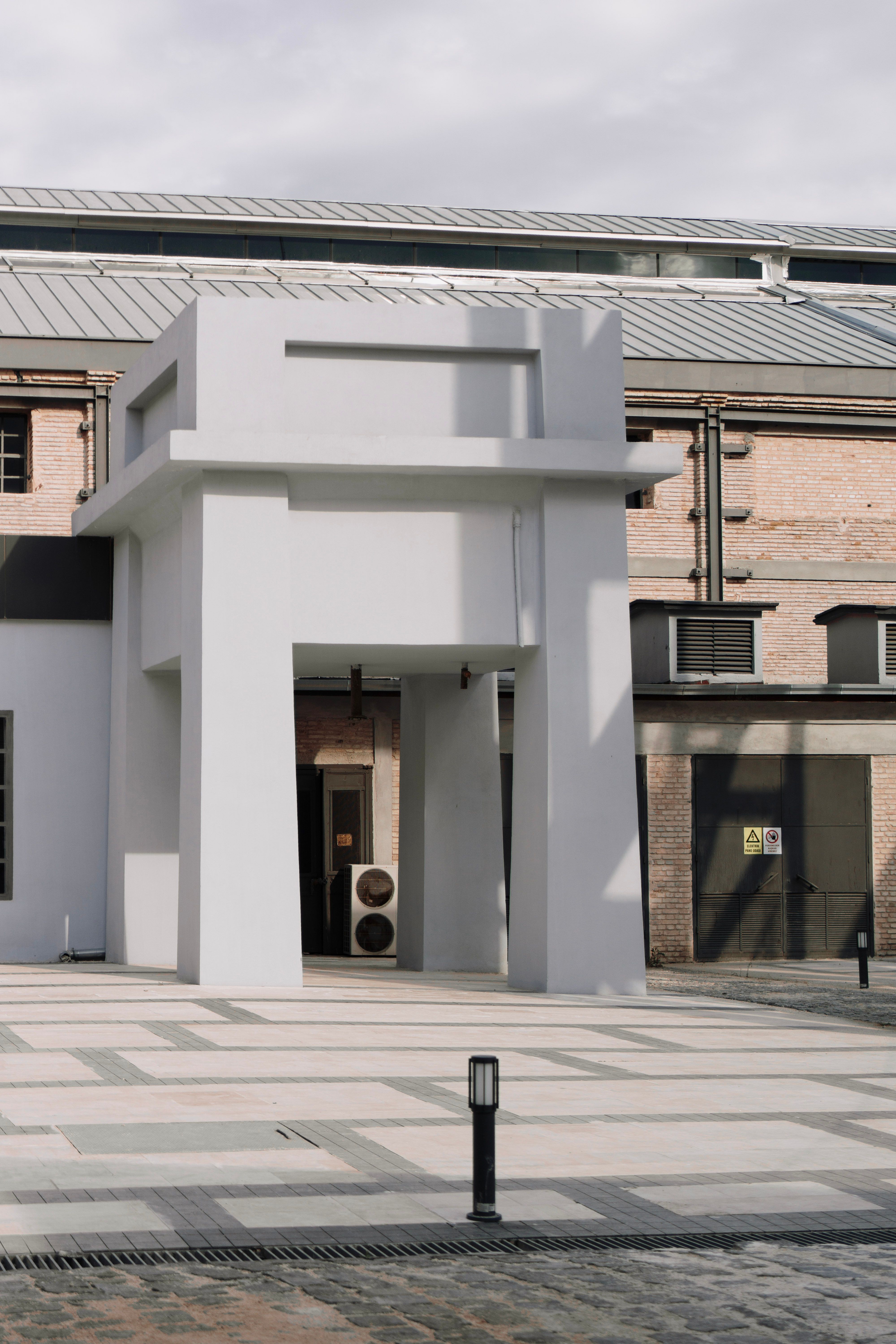 View of Modern Industrial Building with Unique Architecture · Free Stock Photo