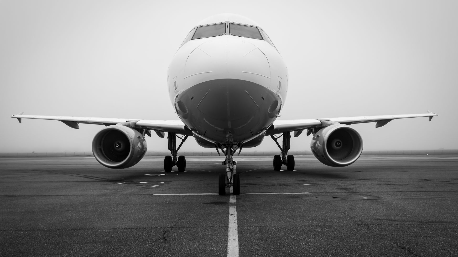 modafinil for jet lag recovery: Boost Energy, Focus, and Productivity A black and white photo of an airplane on a foggy runway, captured head-on. Ideal for aviation themes — modafinil for jet lag recovery