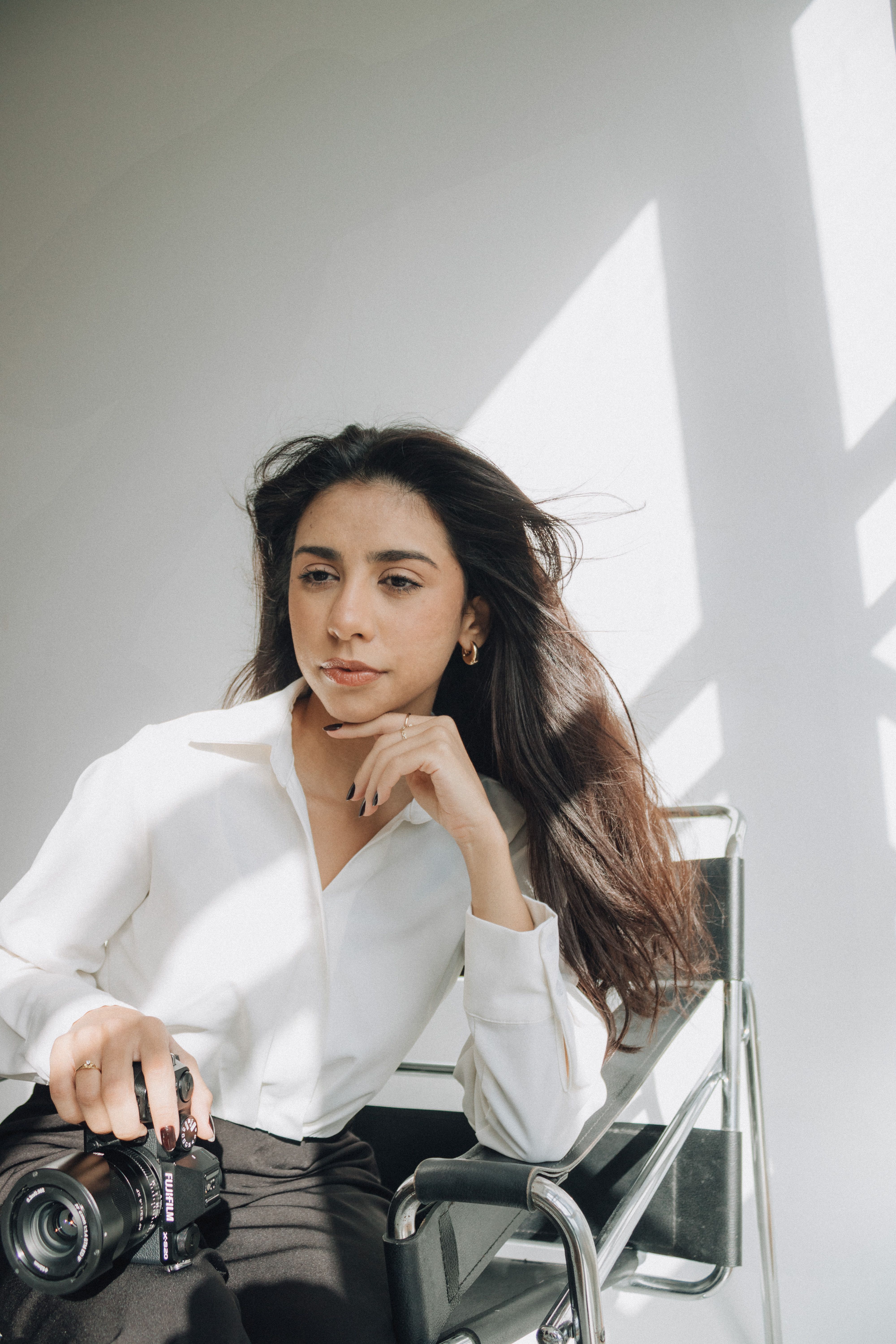 Young Woman in Bright Minimalist Room · Free Stock Photo