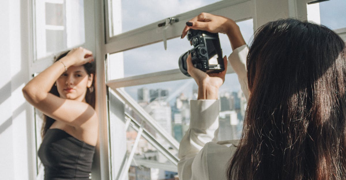 A fashion photoshoot indoors, capturing a model with natural light by a window. Perfect for lifestyle or fashion branding.