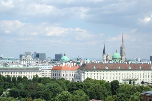 Free Aerial view of Vienna's iconic architecture including St. Stephen's Cathedral and Hofburg Palace. Stock Photo