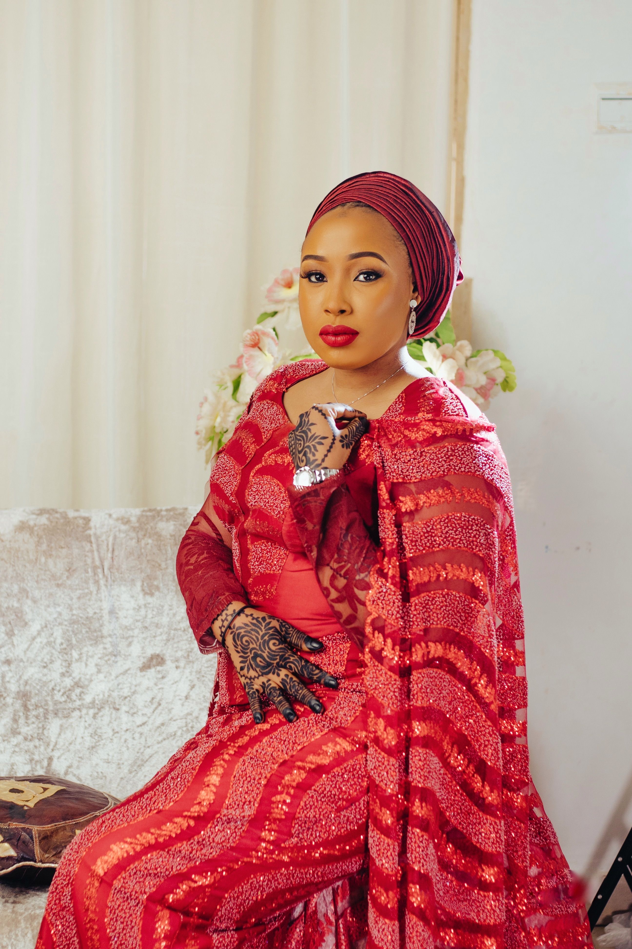 Elegant Woman in Vibrant Red Traditional Attire · Free Stock Photo