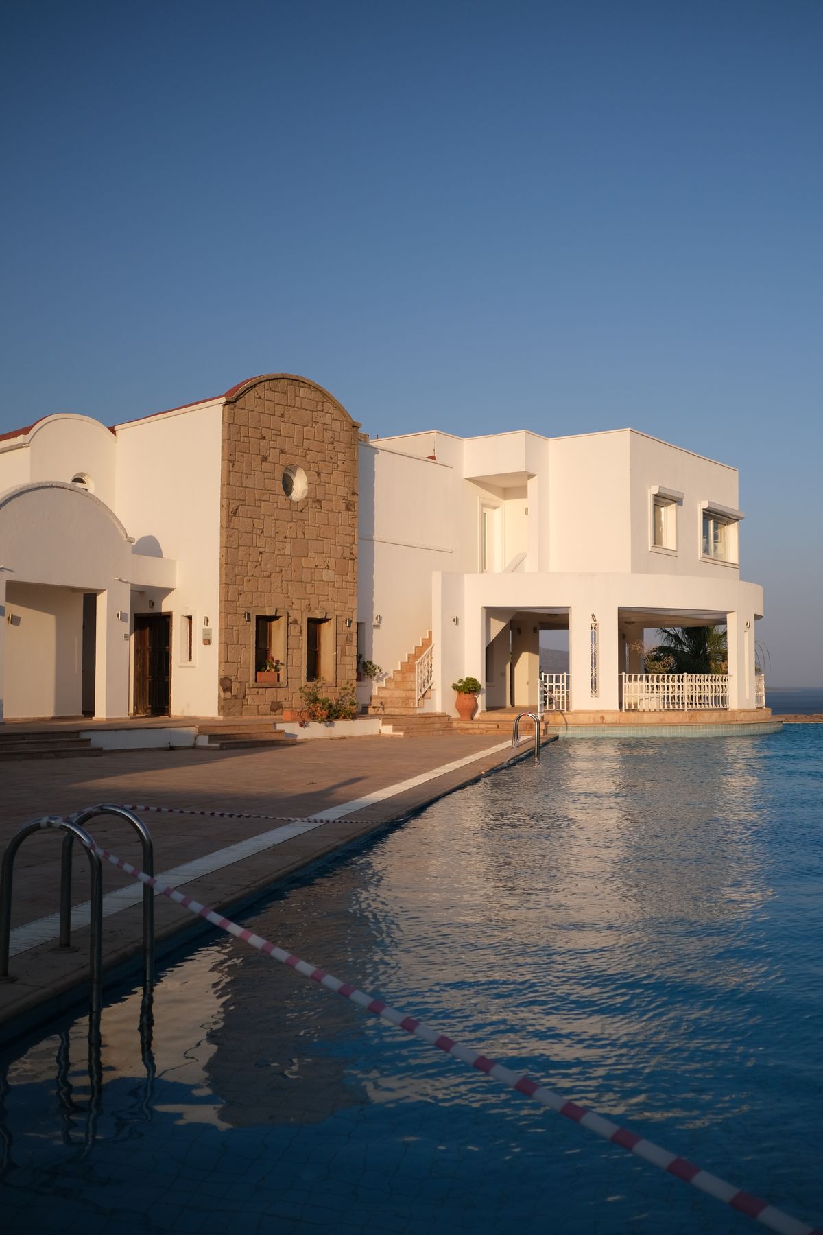 Elegant Mediterranean villa with pool at sunset